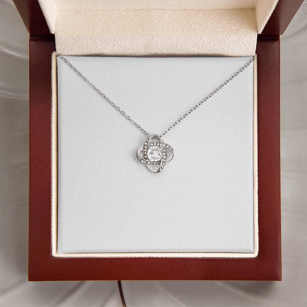 Stunning 18K gold love knot necklace