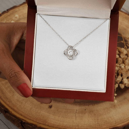 Stunning 18K gold love knot necklace