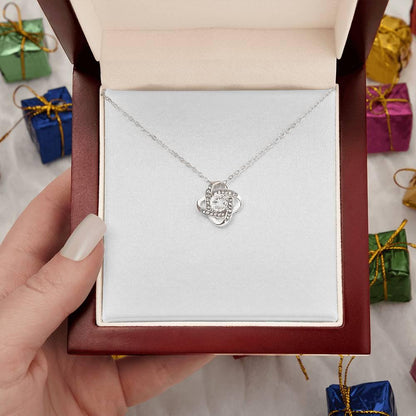 Stunning 18K gold love knot necklace